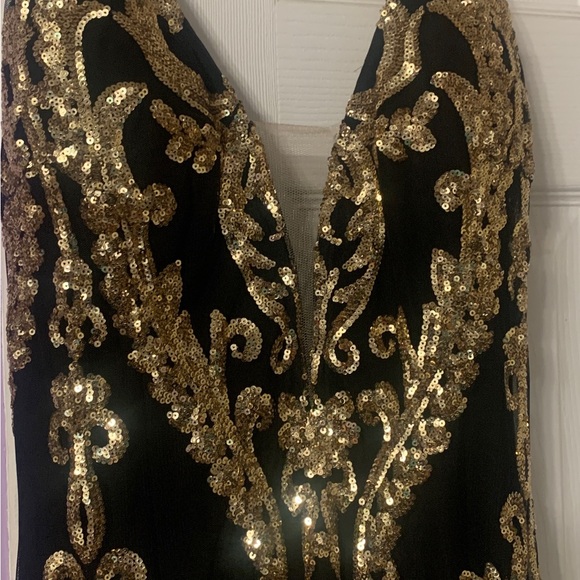 Jovani black and gold dress size 12 Jovani black and gold dress size 12